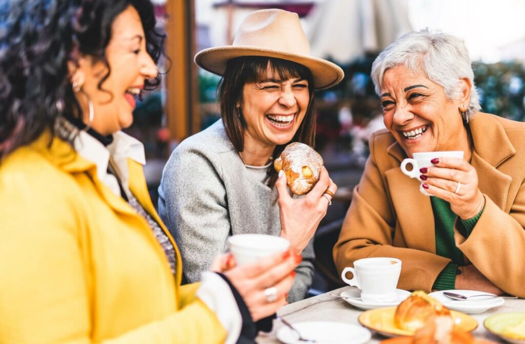 Three senior friends get together to go out for coffee and a walk.